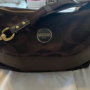 Brown Coach bag.
